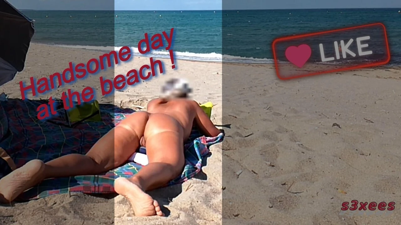 She shows her ass on the beach of Cap d’Agde and jerks off her pussy and then her boyfriend’s cock with voyeurs